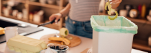 A women throwing waste into a counter