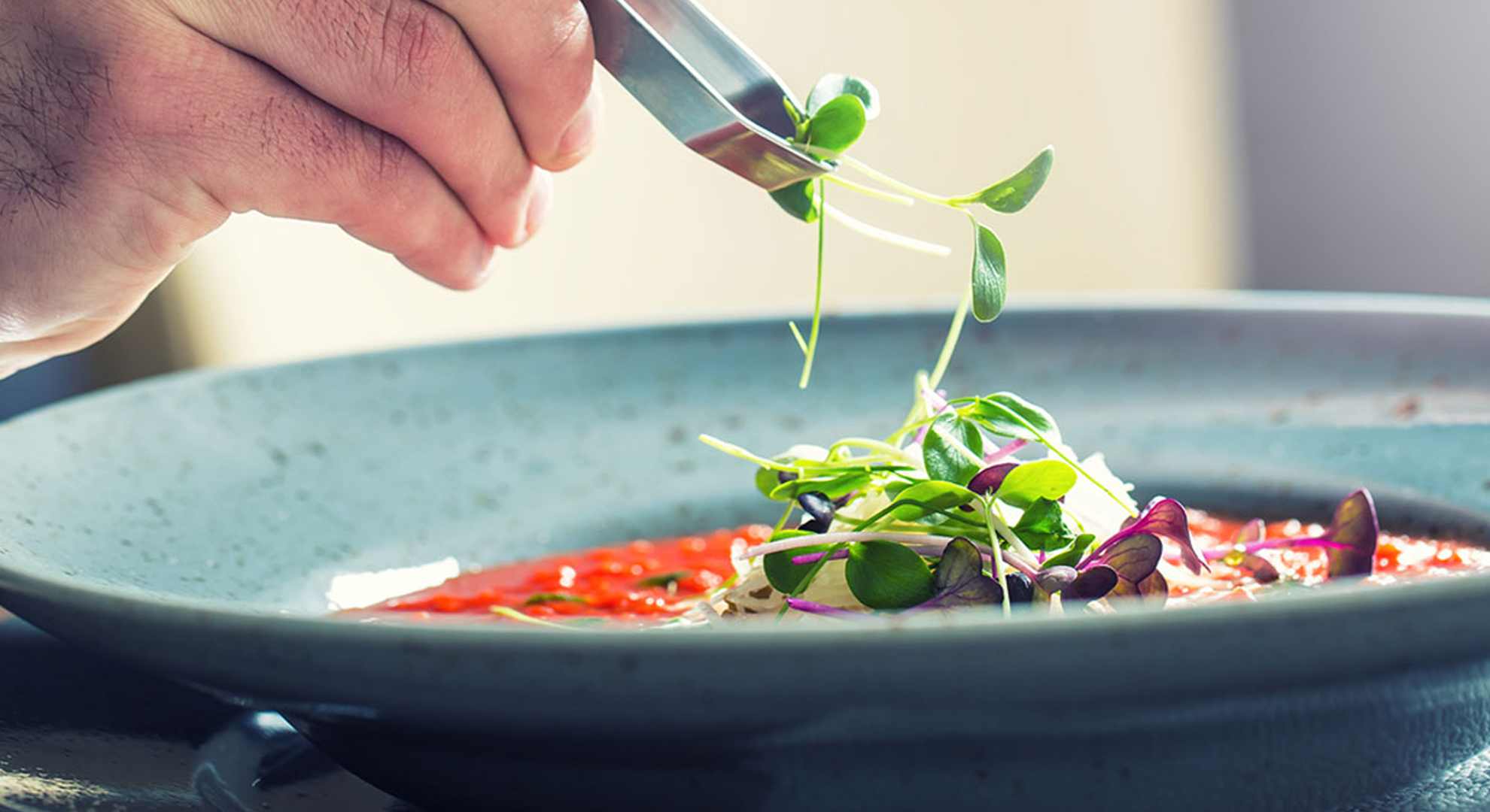 A chef preparing food in a kitchen