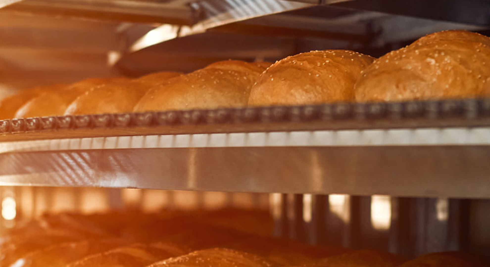 Bread baking in an industrial oven