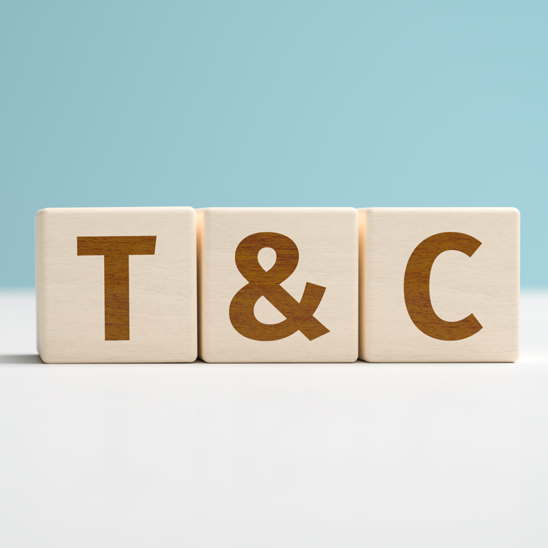 Three wooden blocks with the letters T ampersand and C