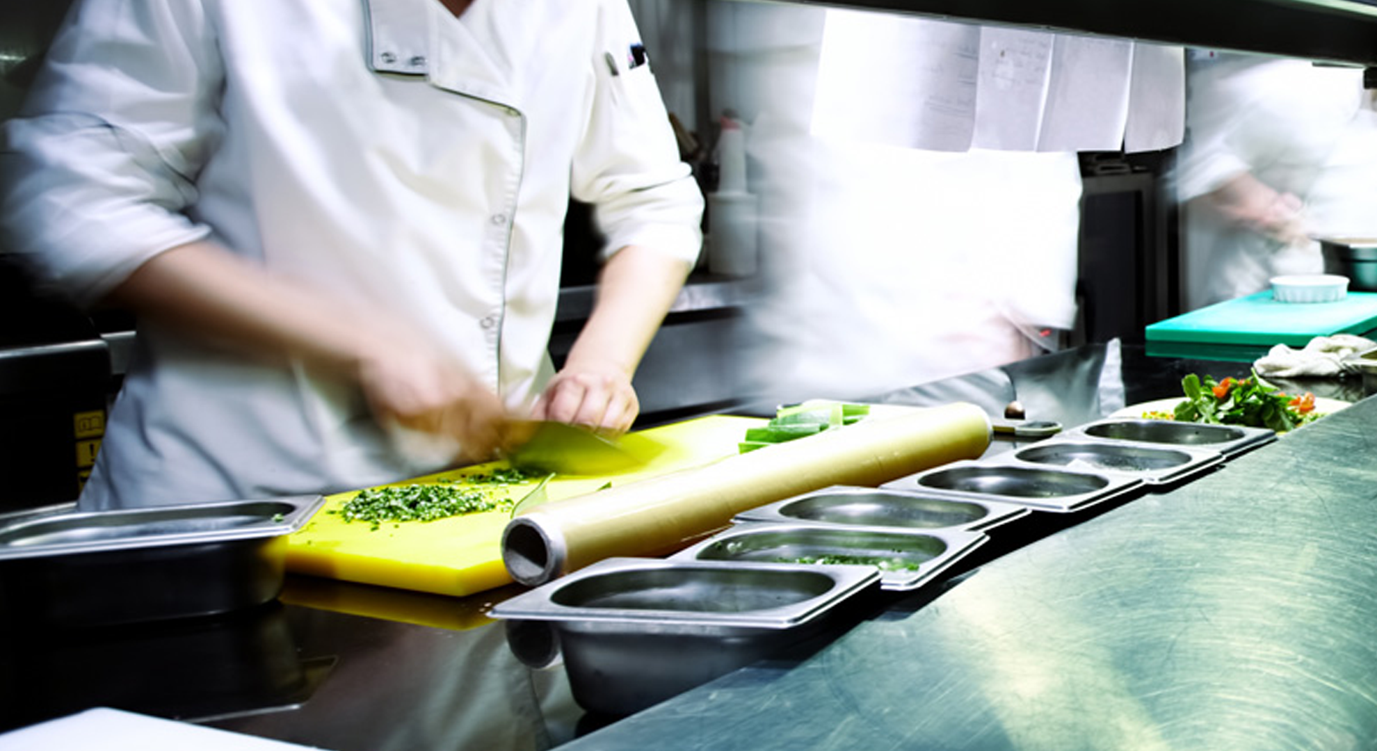 A chef preparing food in a kitchen